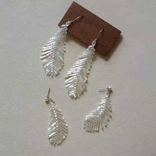 民族风仿猫眼珠羽毛流苏耳环2025新款 高级感耳钉女小众设计感耳钩