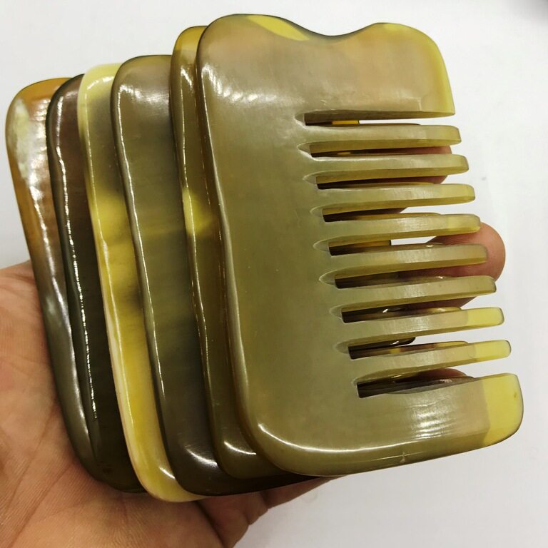 天兰牛角按梳黄八齿梳按刮痧板双用3厂家只销黄牛角刮痧梳