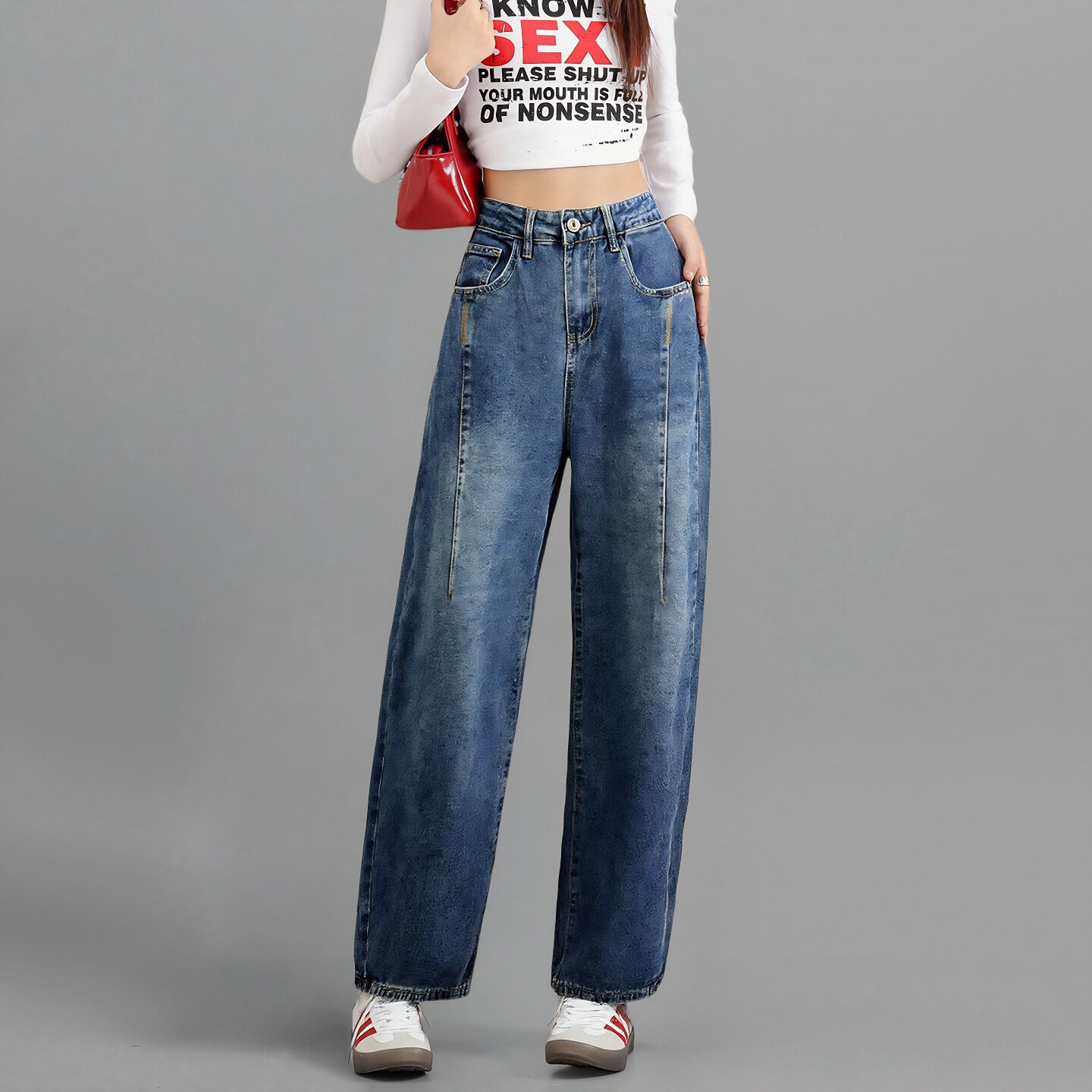 唐狮冬季女加绒宽松弯刀牛仔裤显瘦流行百搭显腿直长裤TD