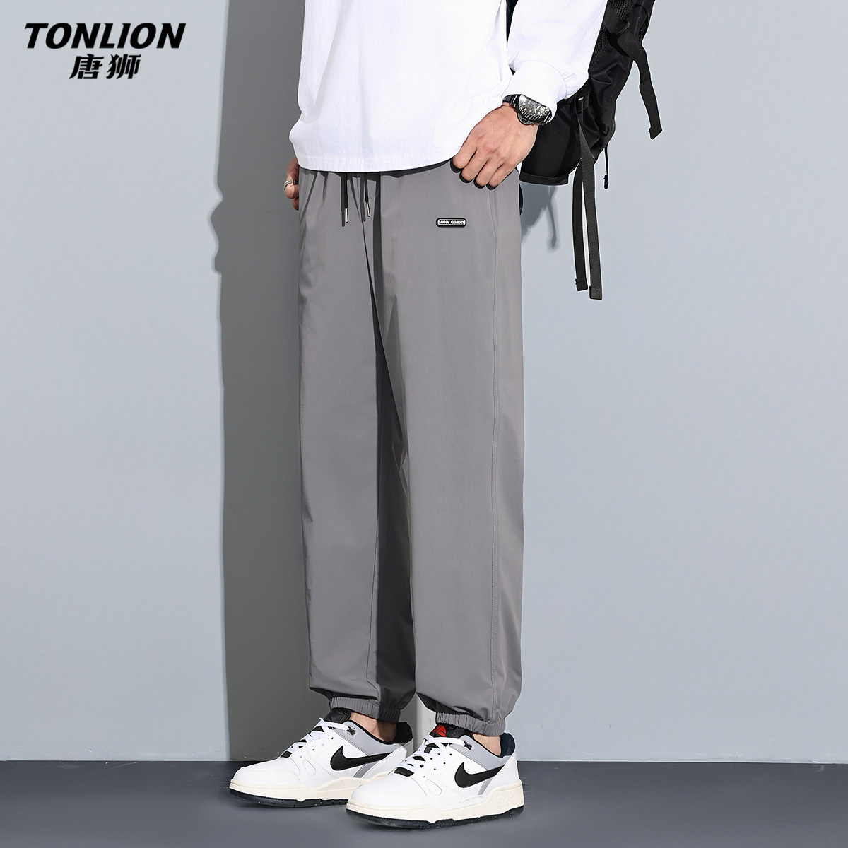 唐狮春夏季休闲长裤男款运动风宽松束脚裤潮流抽绳直筒长裤子