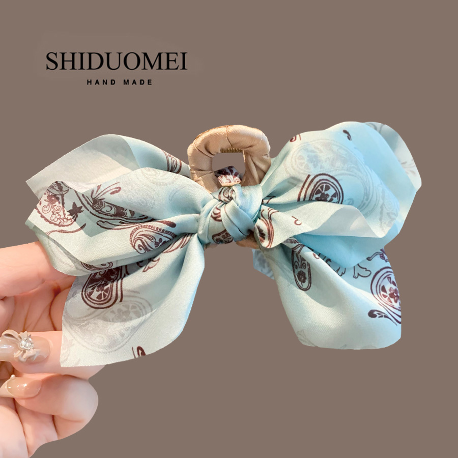 饰多美简约蝴蝶结轻奢发夹