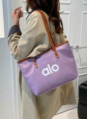 alo韩版简约字母帆布包包小众单肩包通勤手提包大容量托特包女