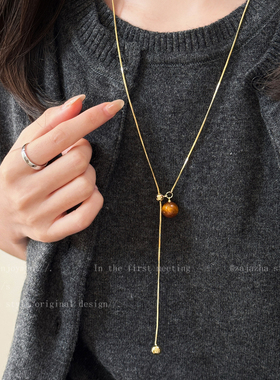 美拉德虎眼石长款毛衣链女款轻奢高级感大气抽拉项链秋冬装饰配饰