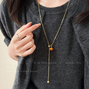 美拉德虎眼石长款毛衣链女款轻奢高级感大气抽拉项链秋冬装饰配饰