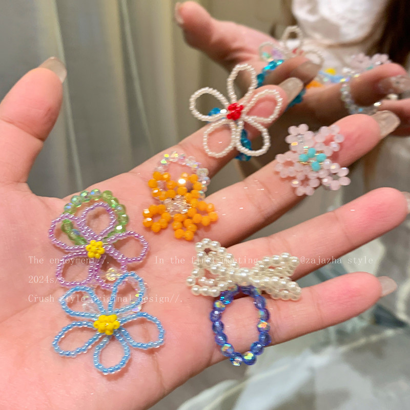 多巴胺撞色镂空花朵戒指女图片