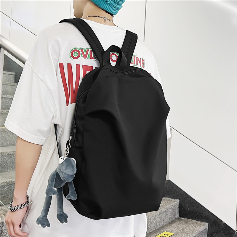 双肩包男士潮流日韩简约纯色大容量高中生大学生书包旅行电脑背包
