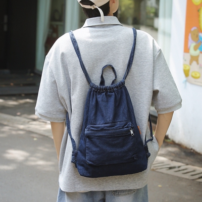 日系帆布双肩包男款束口抽绳牛仔布背包轻便休闲登山包女学生书包