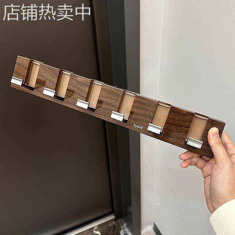 感门后挂钩免打孔粘钩胡桃木纹钢琴键联排