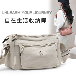 帆布包包女斜挎包2025夏季新款多隔层尼龙防水女士散步手机包小巧