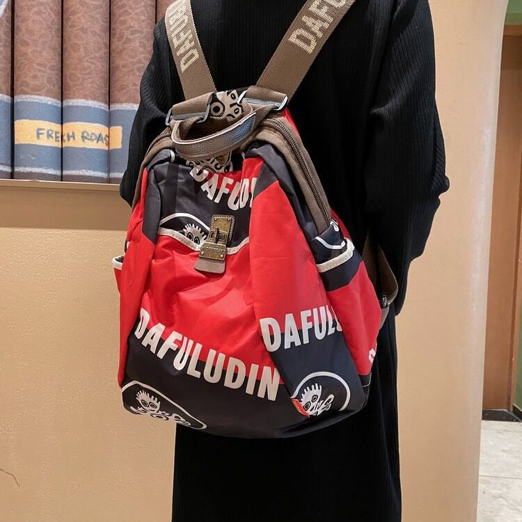 通勤帆布旅行双肩包女2025新款时尚休闲旅游包女士背包牛津布防水