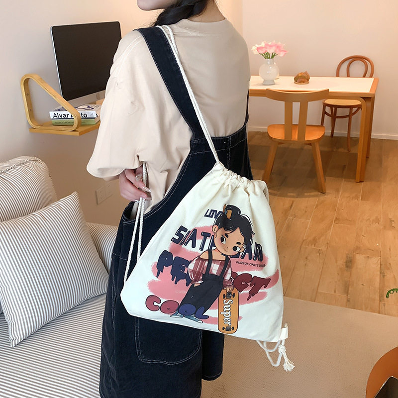 厂家卡通时尚帆布袋女大容量学生书包双肩包2025新款休闲背包