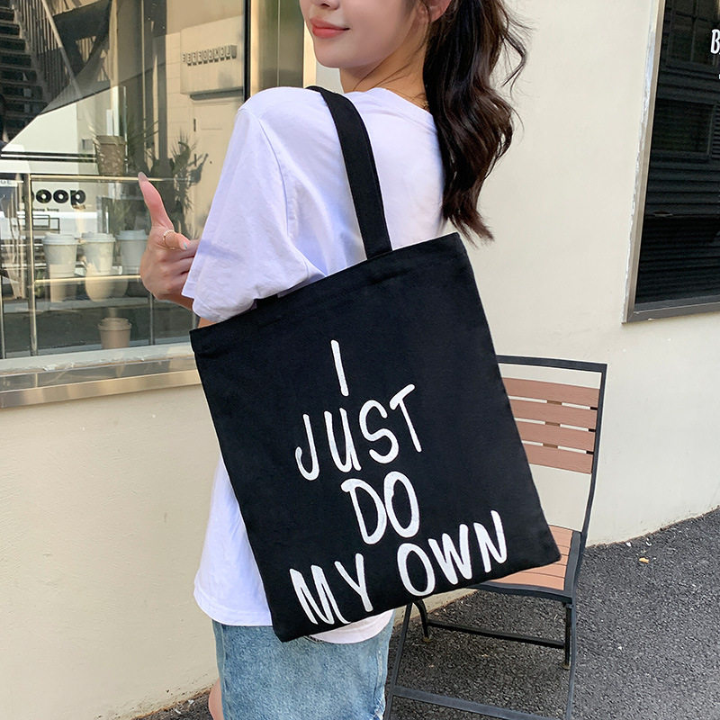 帆布包女2025新款简约单肩包学生文艺上课书包大容量手提袋帆布袋