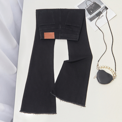 拉夏贝尔黑色微喇牛仔裤女冬2025