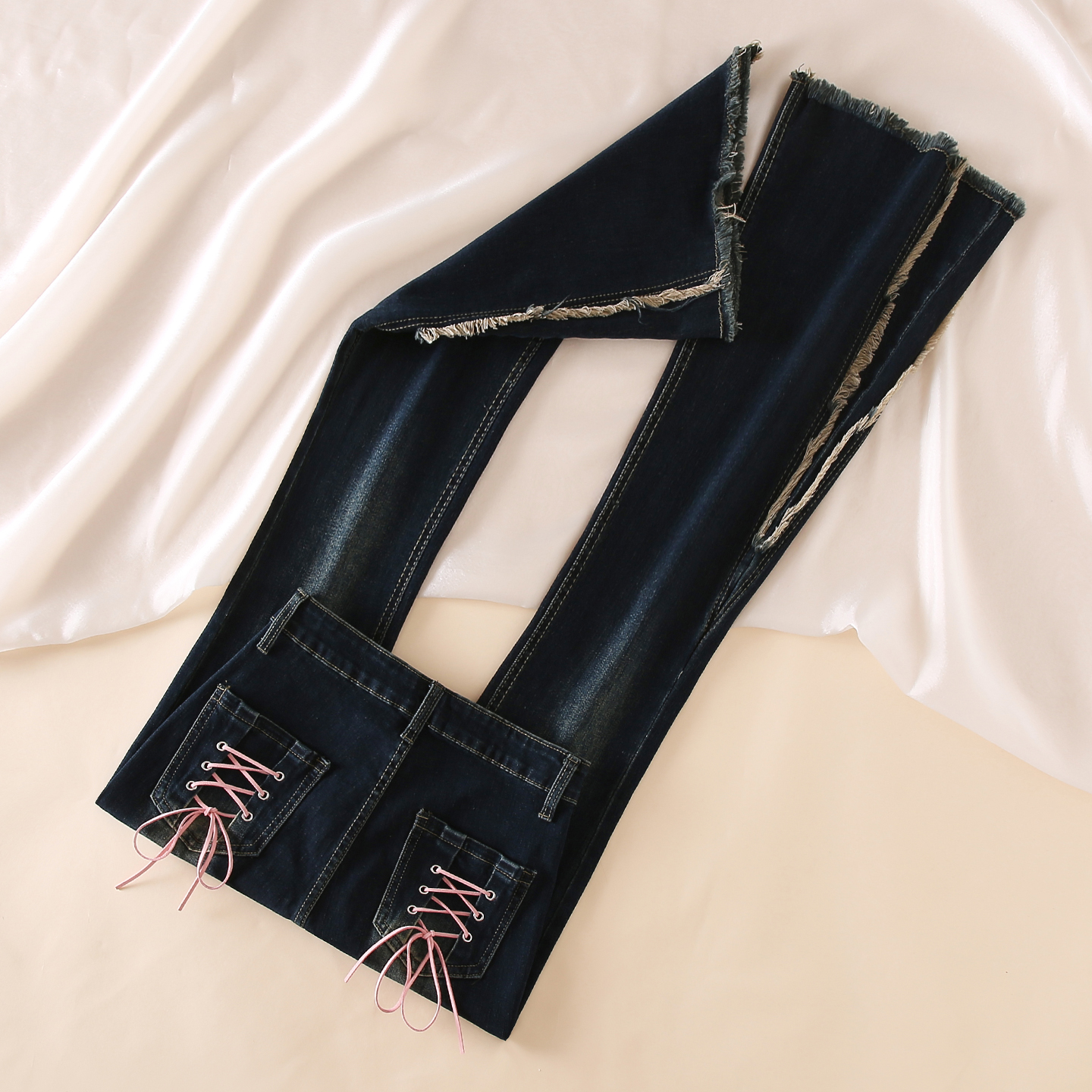 拉夏贝尔毛边微喇牛仔裤女2025秋