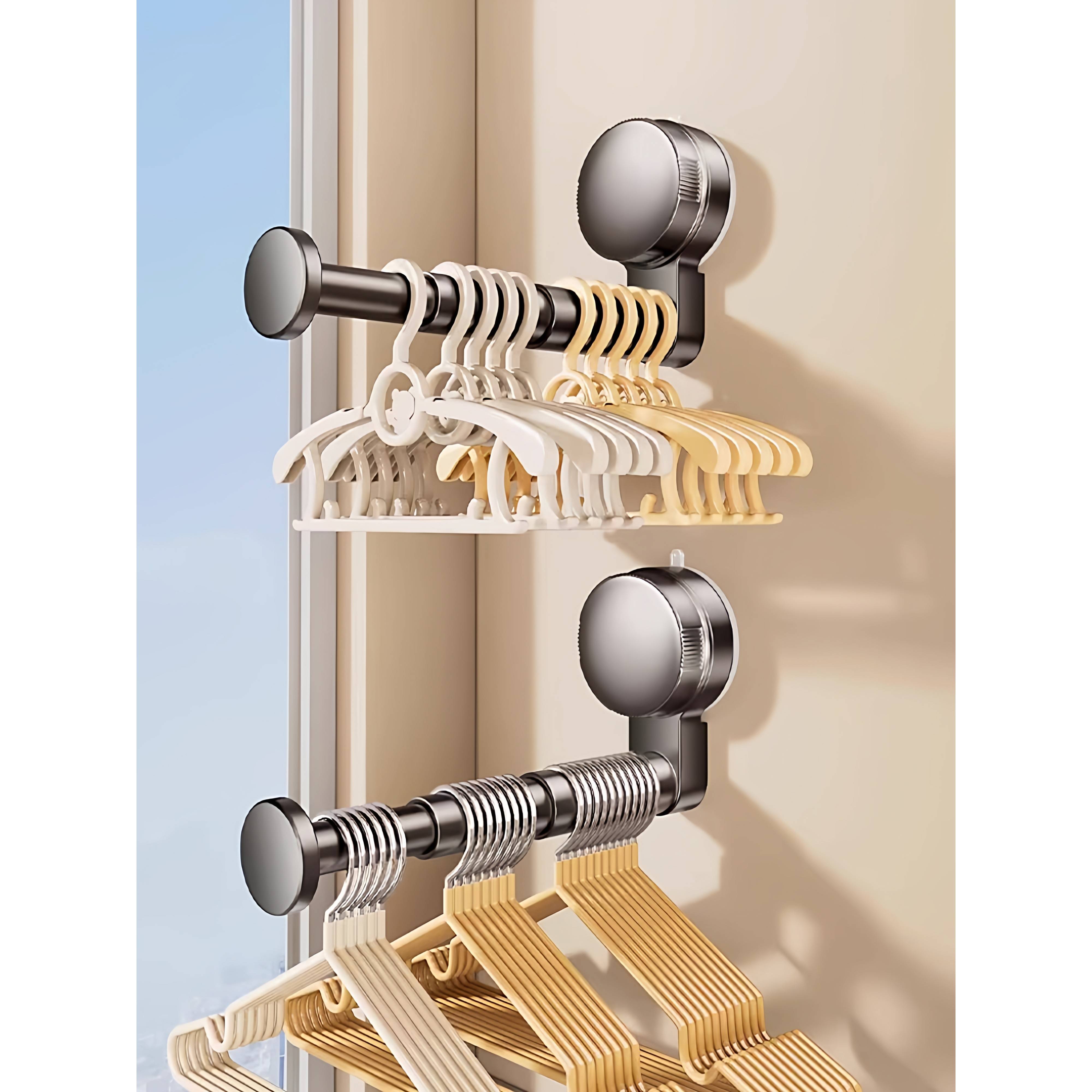 吸盘衣架收纳神器家用阳台壁挂多功能伸缩挂架晾衣架置物架脸盆架