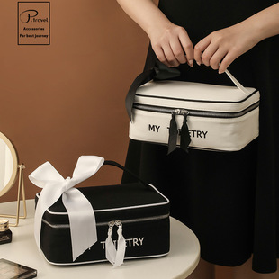 简约旅行新款便携大容量化妆收纳包纯棉帆布防水轻奢少女化妆包