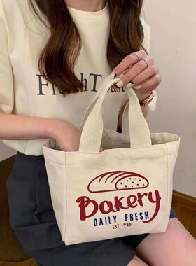 上班族手提袋网红高颜值饭盒袋子日式简约帆布包装雨伞水杯零食袋