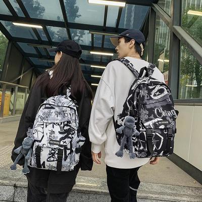 书包男生初中生高颜值大容量美式潮流护脊减负炫酷帅气新款双肩