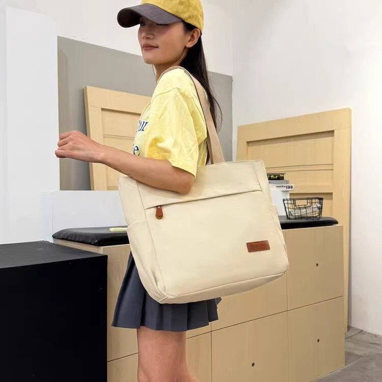 时尚大容量包包女大学生上课手提布袋上班帆布单肩通勤托特妈咪包