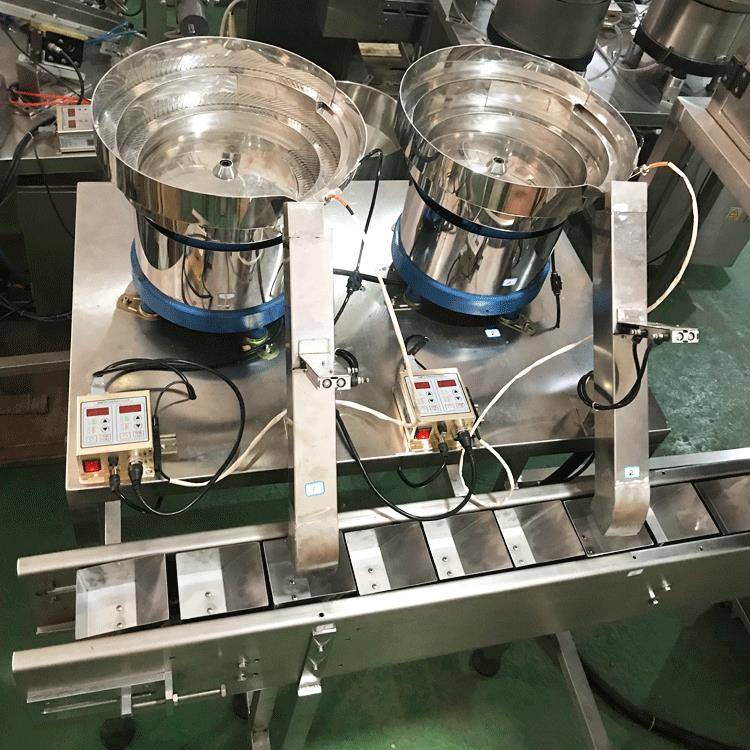 供应山东八宝茶包装机带链斗带电子秤带振动盘有视频