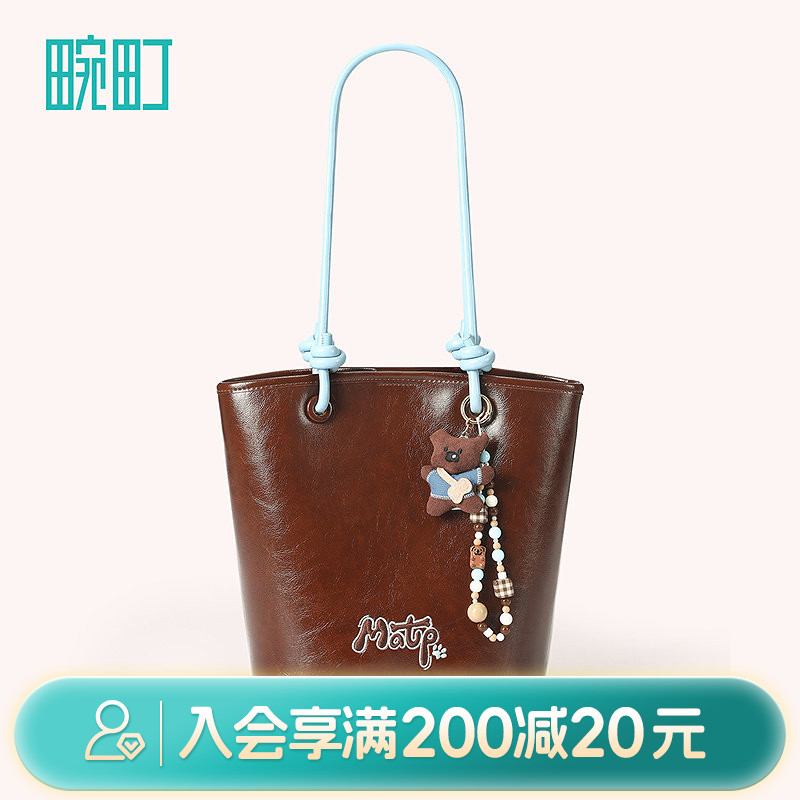 畹町焦糖可露丽油蜡皮包女秋冬复古蓝棕单双肩通勤女包抽绳水桶包