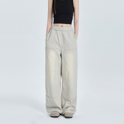 PMET做旧水洗喷色抽绳卫裤