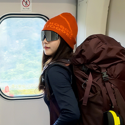 橙色针织帽女2025新款川西旅游户外登山徒步拍照帽子女毛线堆堆帽