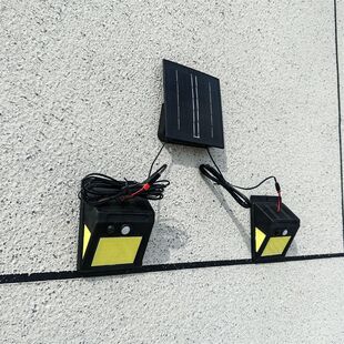 一拖二人体感应太阳能灯室内外照明灯户外防水家用庭院灯COB壁灯
