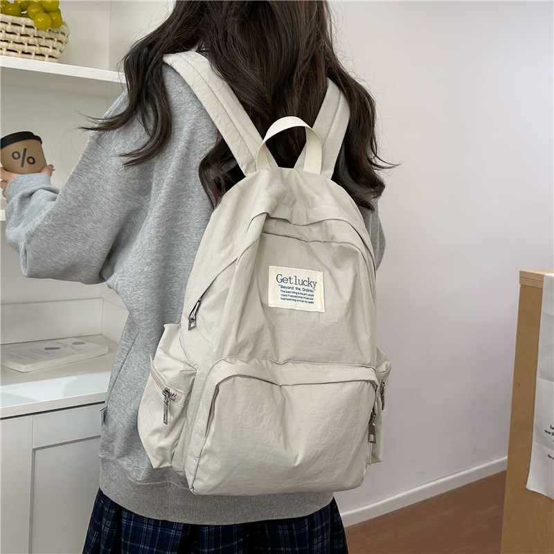 2025春夏新款双肩背包车缝线拉链纯色尼龙布时尚春季夏季女包