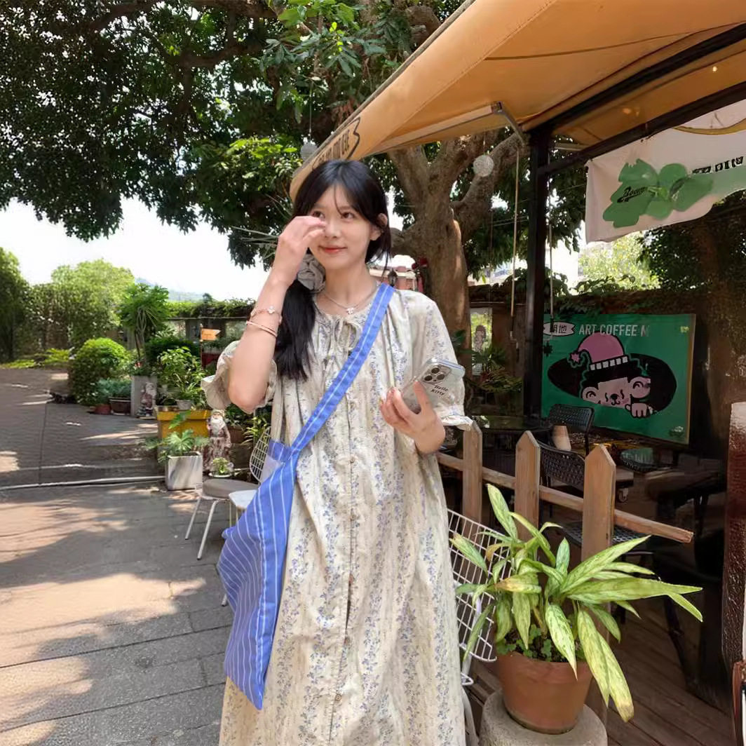 日系森系杏色碎花长款衬衫裙女夏2026新款宽松显瘦棉麻小众连衣裙