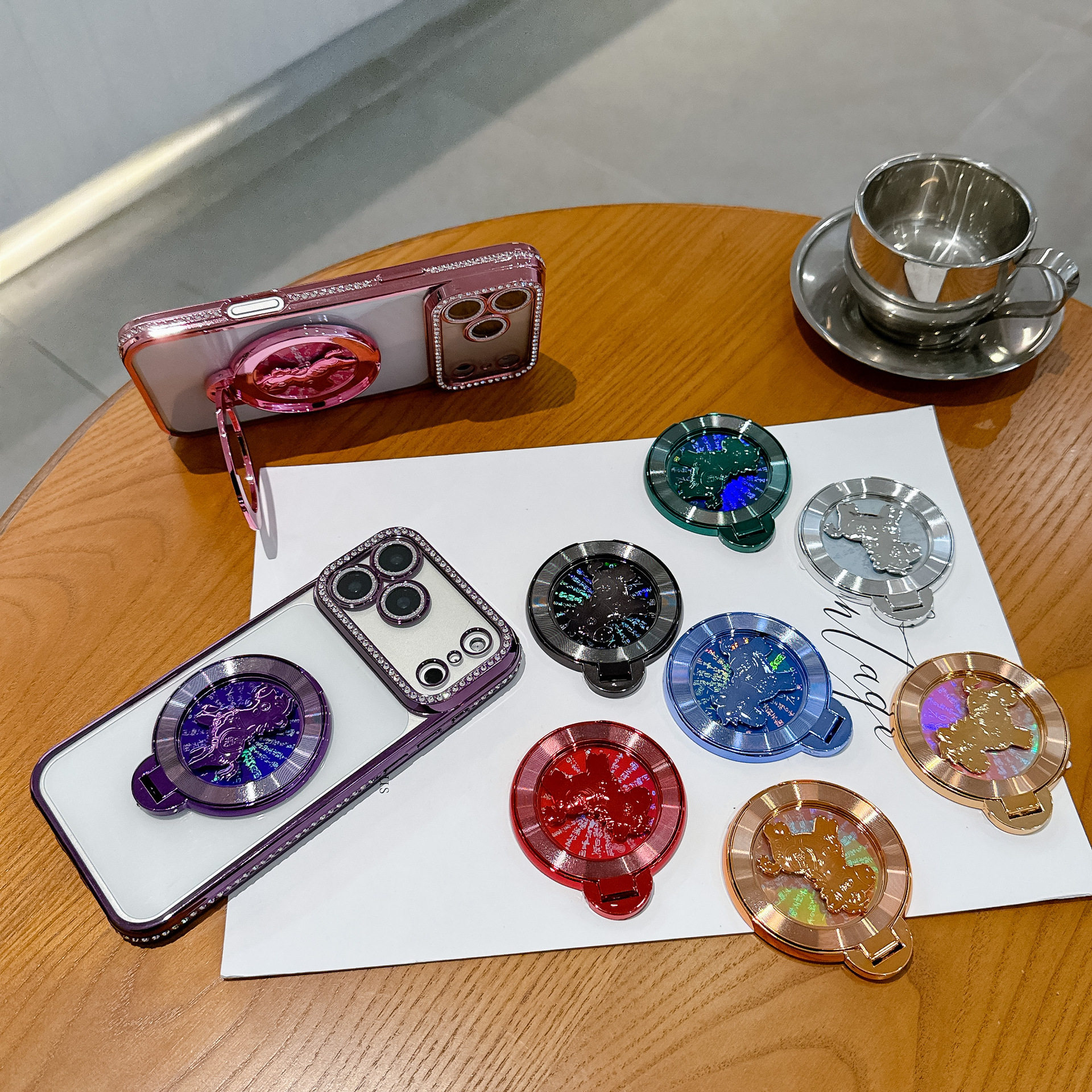 新款手机支架马到成功旋转陀螺电镀塑料黏贴式横竖支撑手机壳背贴