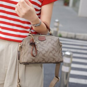 优草坊正品女包2026年新款高级多层单肩斜挎休闲百搭手拎手拎波士