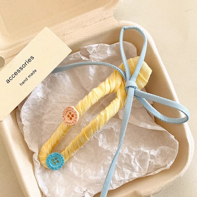 小清新黄色蝴蝶结鸭嘴夹发夹女图片