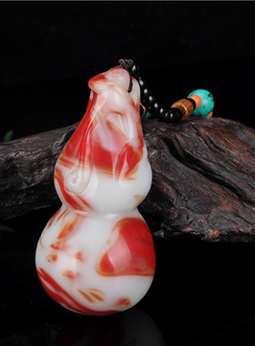 新疆鸡血玉葫芦福禄寿手把件