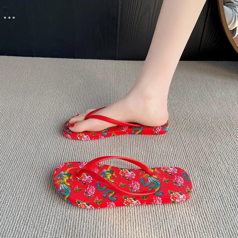2025新款夏季防滑男女情侣东北大花人字拖沙滩外穿网红夹趾鞋拖鞋