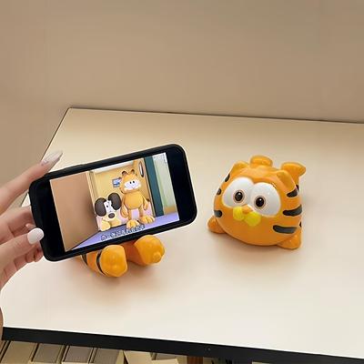 挖到吼有创意的加菲猫手机支架啦