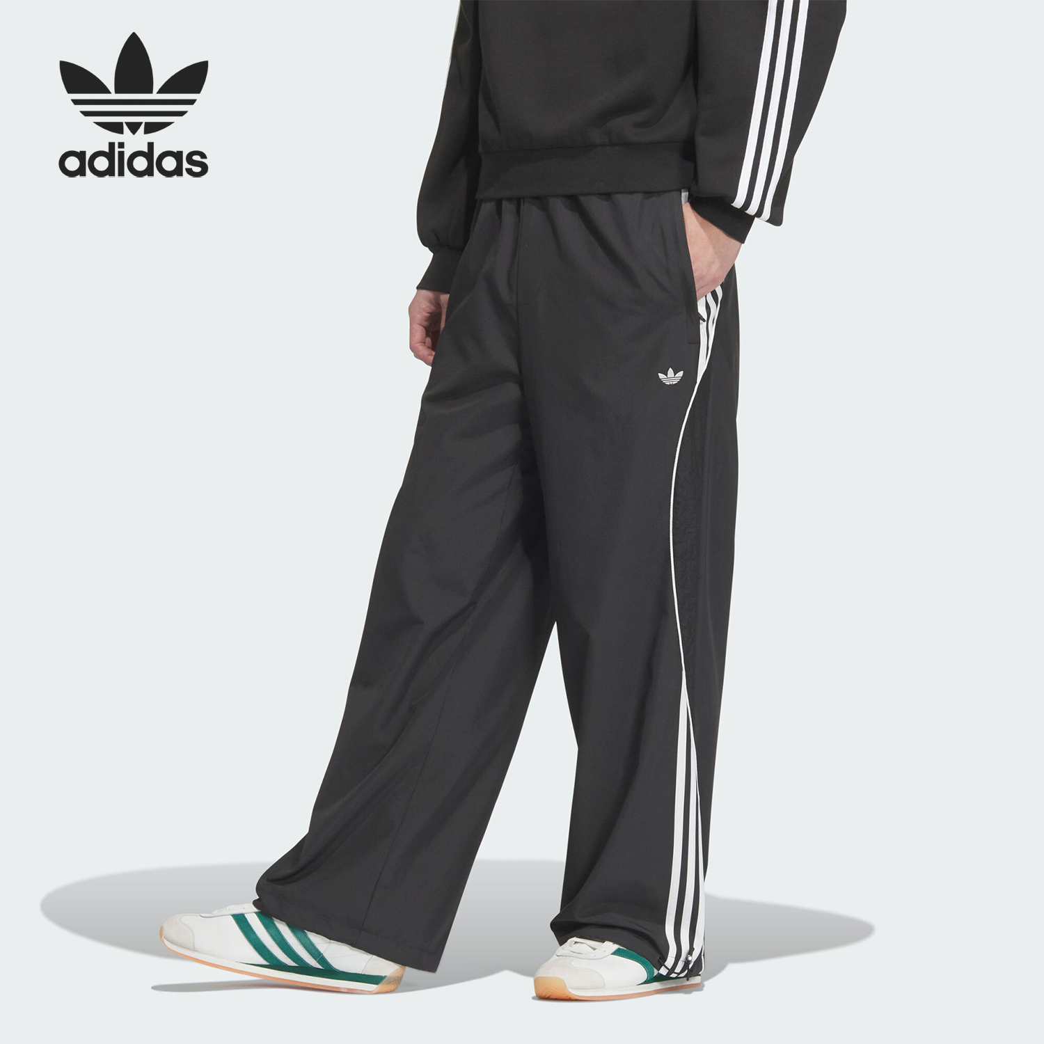 Adidas/阿迪达斯官方正品三叶草男士拼接宽松休闲梭织长裤JN3790