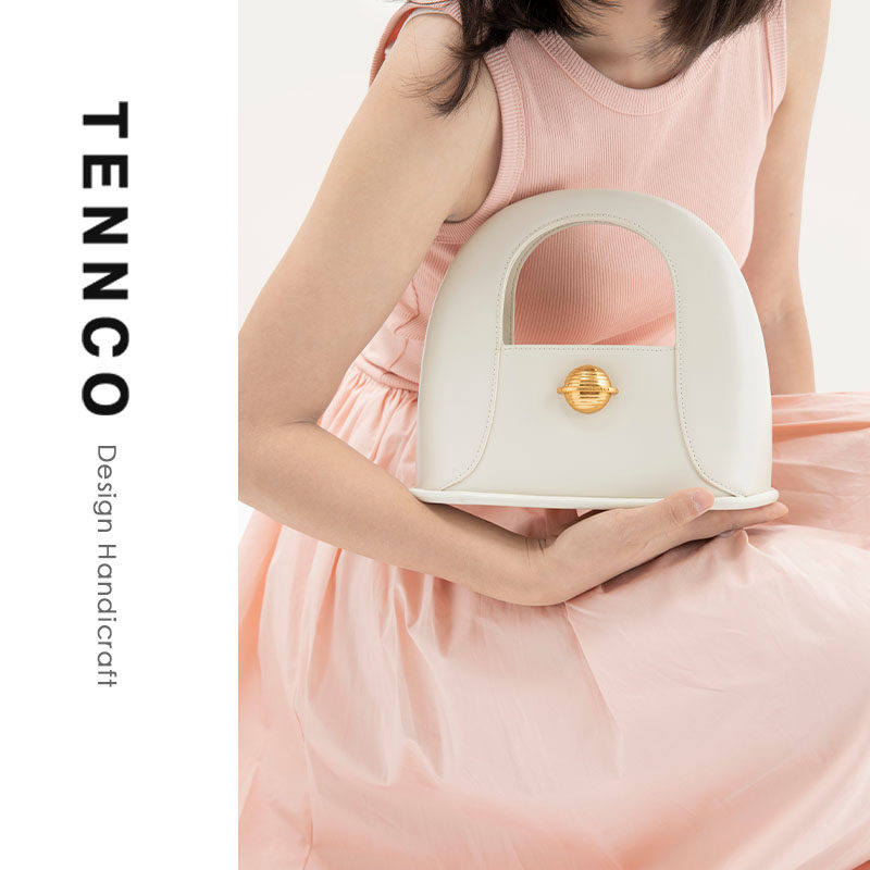 【6折特价】设计款飞碟包春夏新款真皮小众包单肩斜挎手提包女包