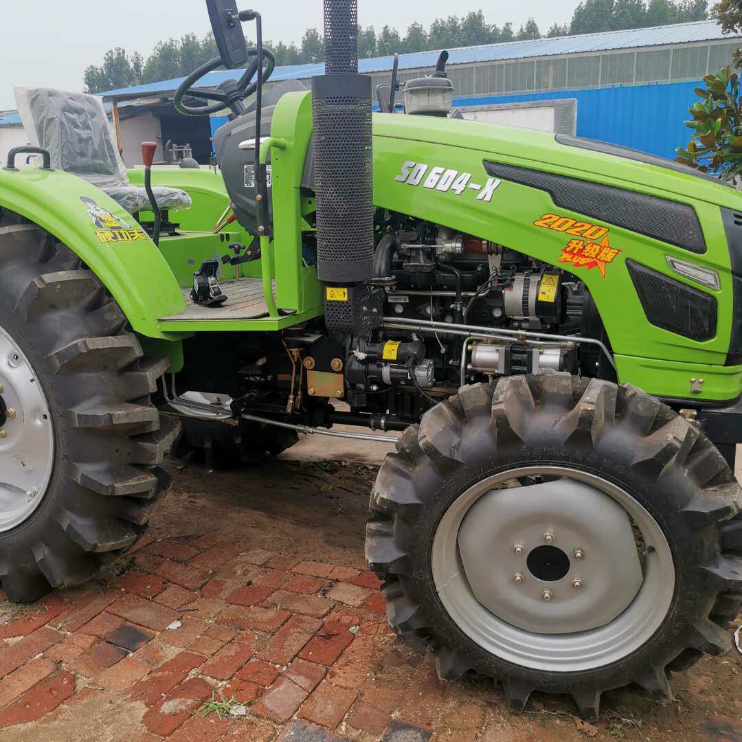 国补农用旋耕犁地机 四驱中型拖拉机低油耗 打田 耕整开垦拖拉机