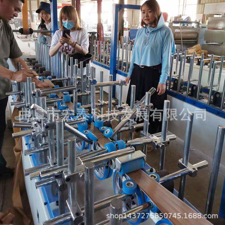 源头厂供HT-BFJ300型 木质格栅版 集成墙板 护墙板包覆机