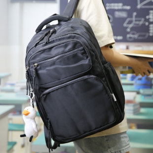 大容量双肩包男生2025新款旅行背包简约多隔层高中生书包减压护脊