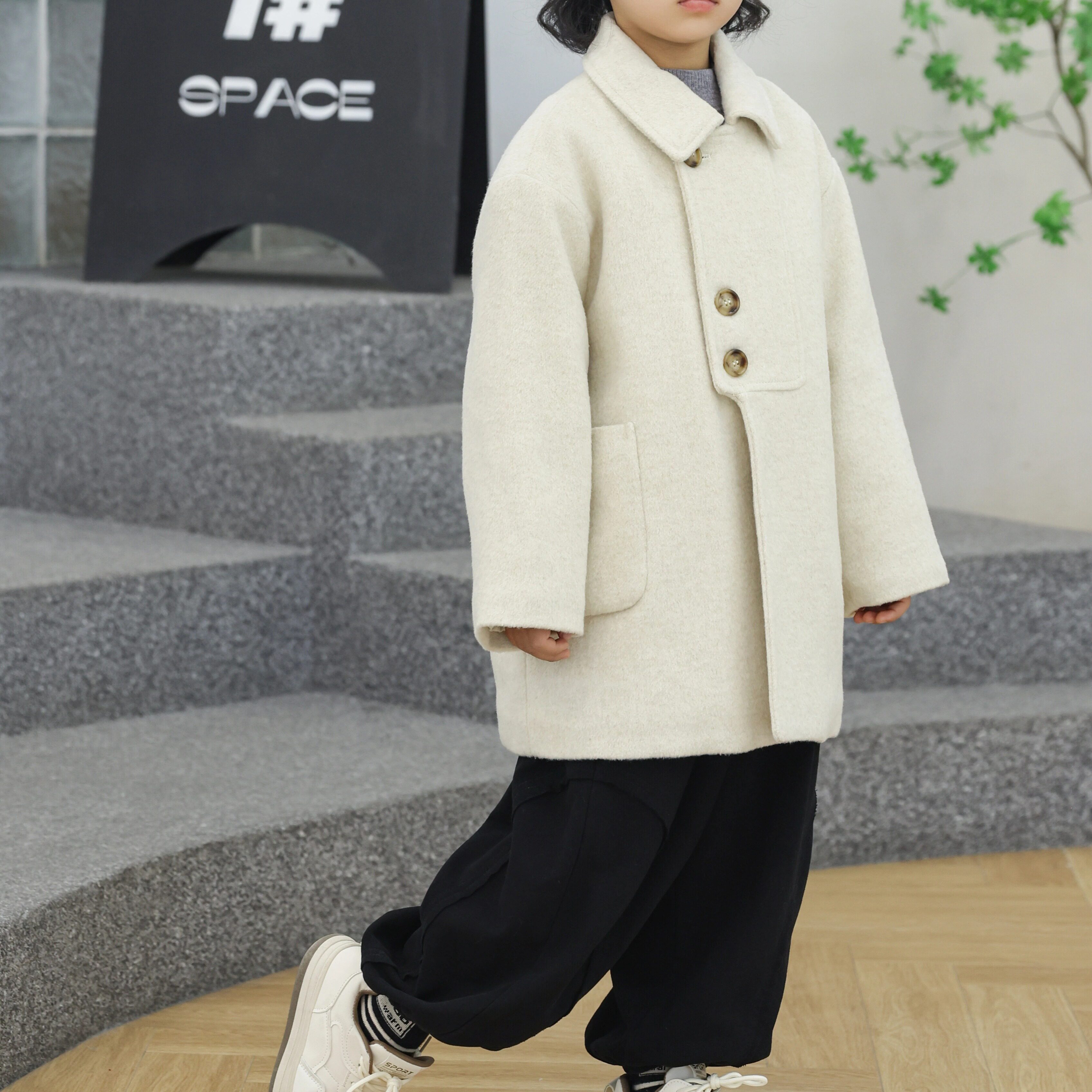 6865款不规则门襟大衣