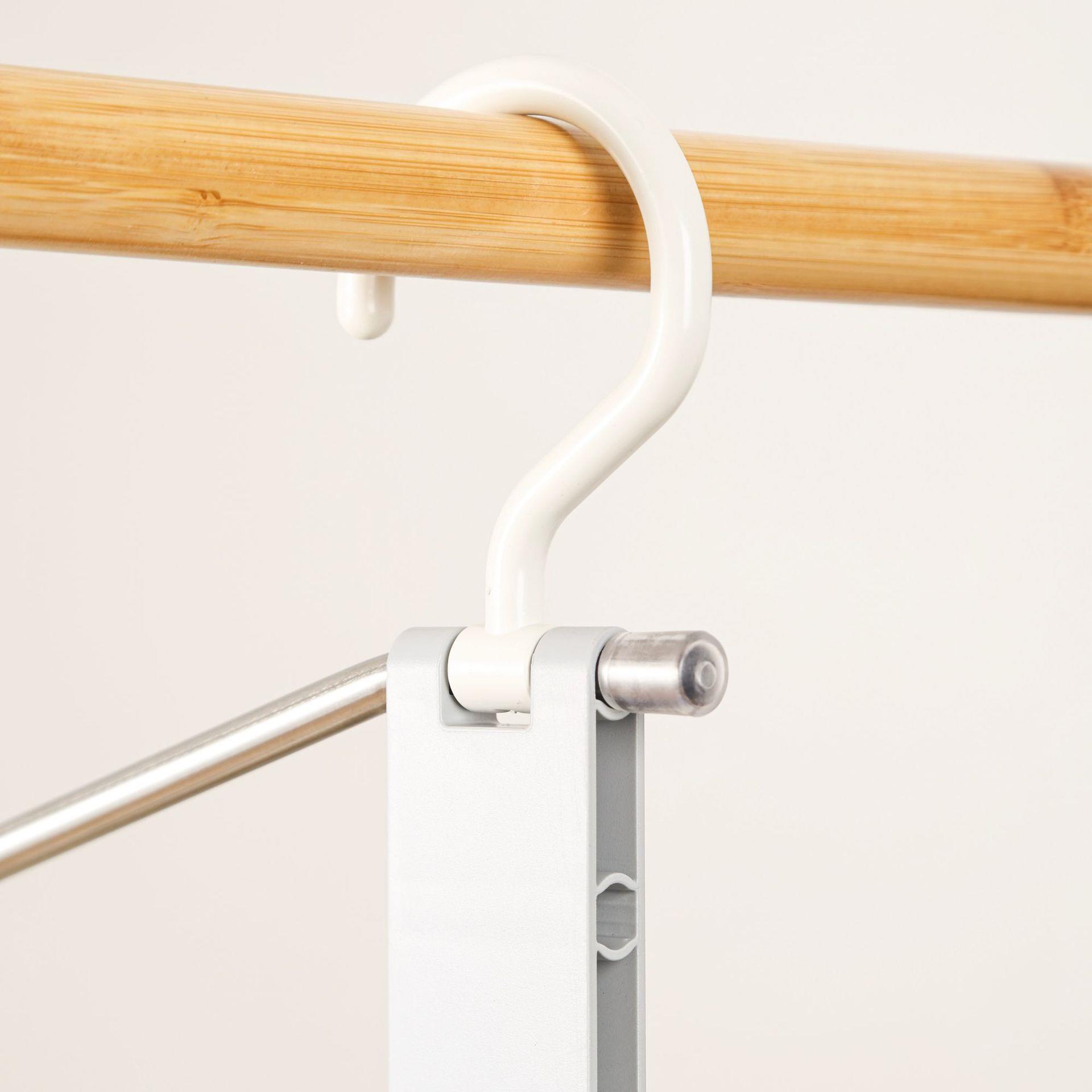 Folding and Stretching Magic Pants Clip 折叠伸缩魔术挂裤夹