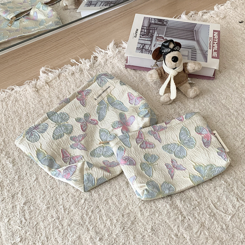 蝴蝶化妆包立体面料护肤品收纳包高级感便携式零钱包旅行手拿小包