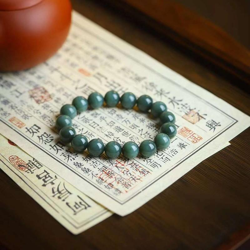 和田玉手串碧玉黑猫眼手串
