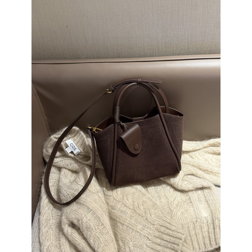 官方正品高级感水桶包包女2025秋冬季新款磨砂牛皮手提托特包真皮