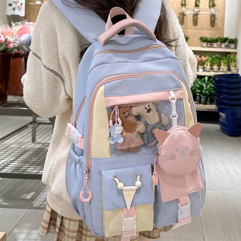 黑色书包小学生初中生2025新款女生高颜值大容量女孩痛包双肩包女