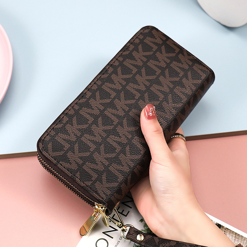 欧美时尚字母大容量手拿包妇