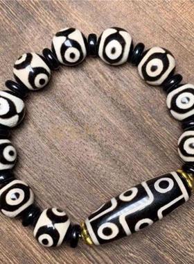 西藏真品风化包浆九眼天珠