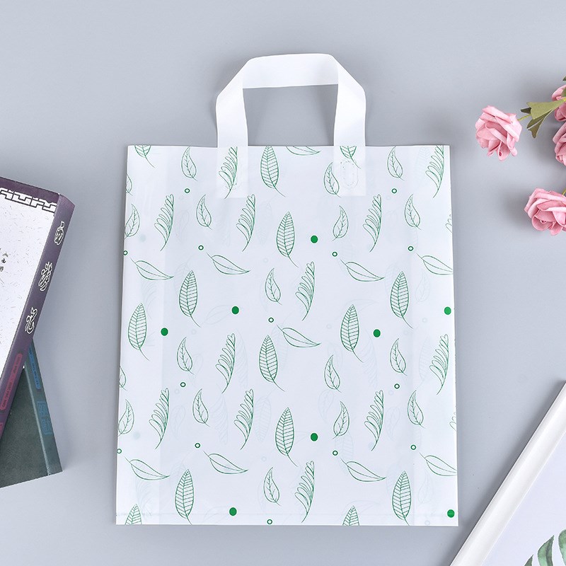 新款简约绿叶PE塑料手提袋 衣服装店加厚袋礼品包装购物胶袋